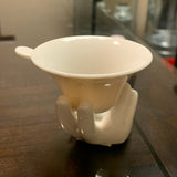 Porcelain hand tea strainer